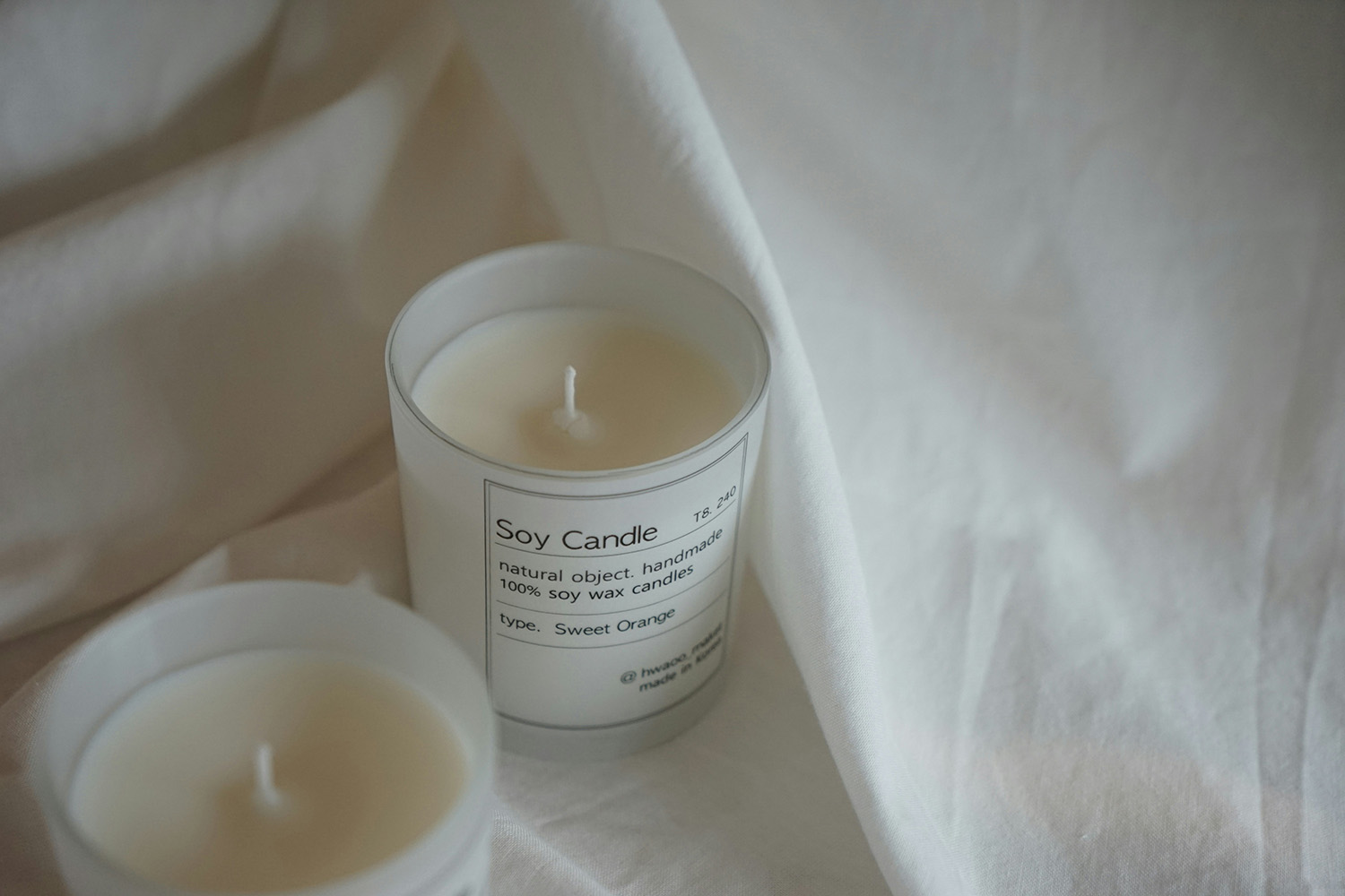 Relaxing massage room with candles and soft lighting